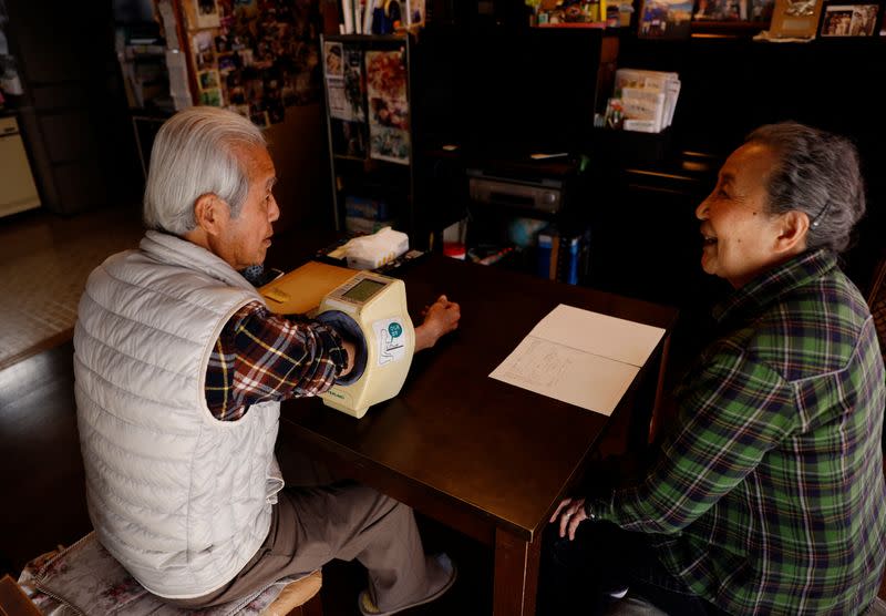 FILE PHOTO: The Wider Image: For Japan's ageing soccer players, 80 is the new 50