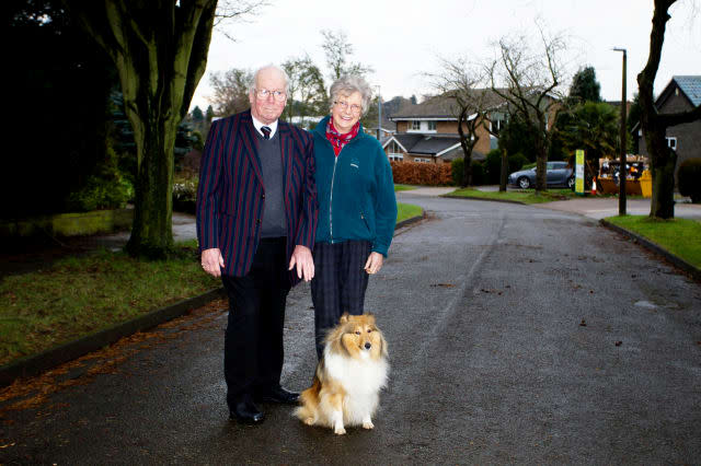 Derek and Patricia Read with their Shetland sheepdog Missy on Dormy Close, in Bramcote Nottinghamshire. 8/3/2017.  A postman who says he was chased by a cute Shetland sheepdog is refusing to deliver to residents on a Nottinghamshire street.  See NTI story NTIDOG.  Three-year-old bundle of fluff Missy, has allegedly chased one postie on his round which has resulted in most homes in the street not receiving mail since Christmas Eve.  One couple say the problem has been going on for 18 months.  Royal Mail has decided that residents in Dormy Close, in Bramcote, will have to do a four-mile round trip to Beeston Post Office if they want their letters or packages.  But owners of the dog, Derek and Patricia Read, said Missy was just doing her duty as a guard dog - but has never bitten a visitor to their home.