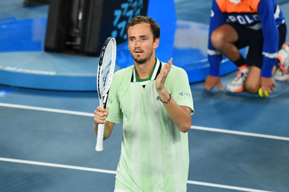 Daniil Medvedev (pictured) claps and thanks the crowd after beating Felix Auger-Aliassime.