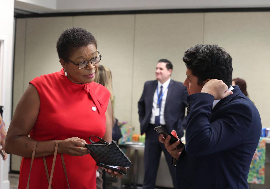 State Rep. Marie Woodson speaks to an attendee after a news conference unveiling Keiser University’s nursing advisory council on Wednesday, July 13, 2022, at the National Association of Hispanic Nurses Conference in Miami. The conference was at the Hyatt Regency. The panel discussed how to retain nurses in Florida amid a national shortage.