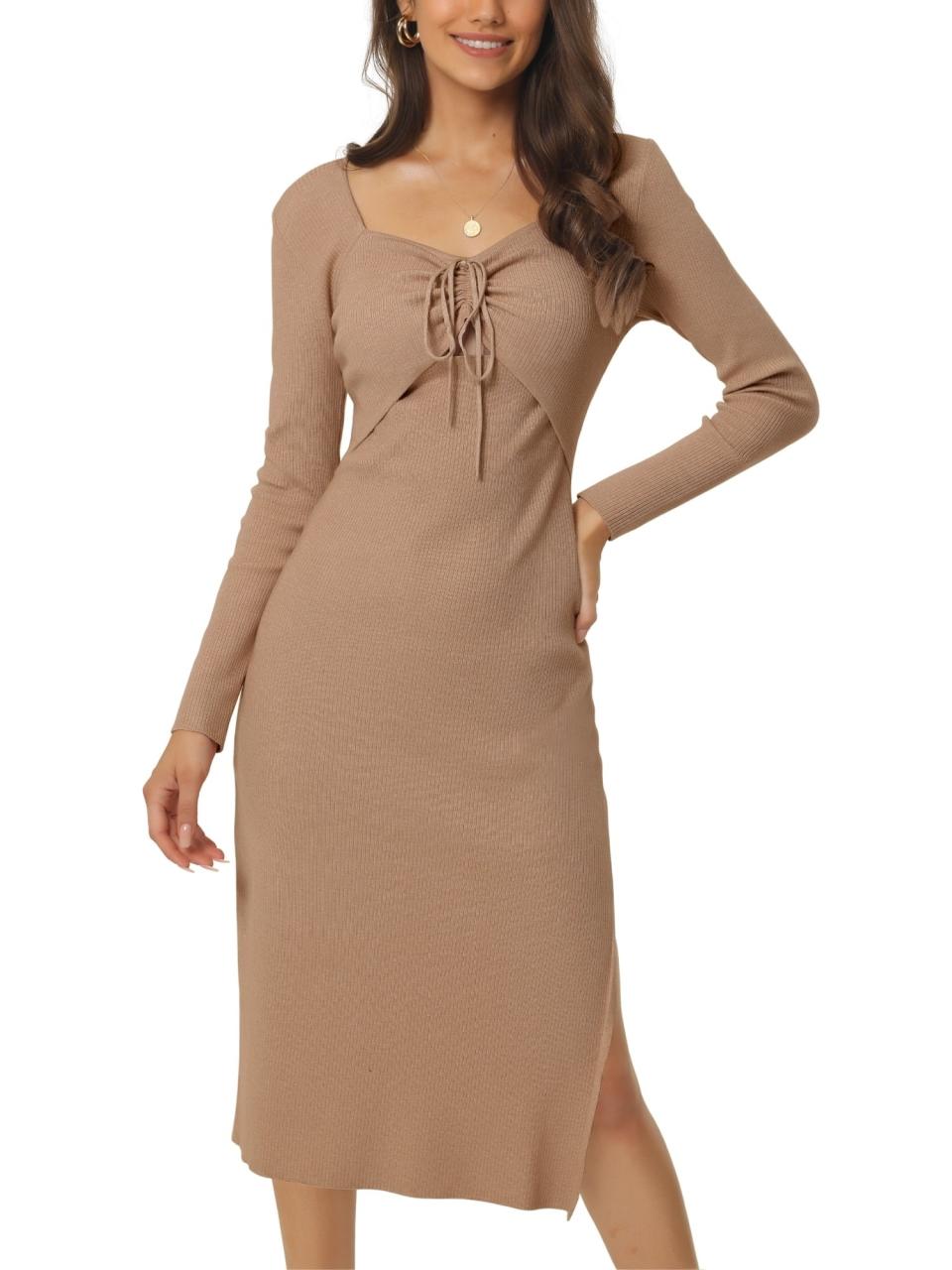 a model wearing the tan dress