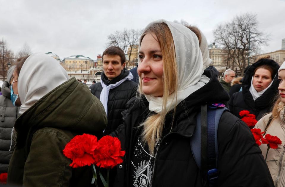 The relatives of servicemen gathered to lay flowers at the Tomb of the Unknown Soldier on Saturday (REUTERS)