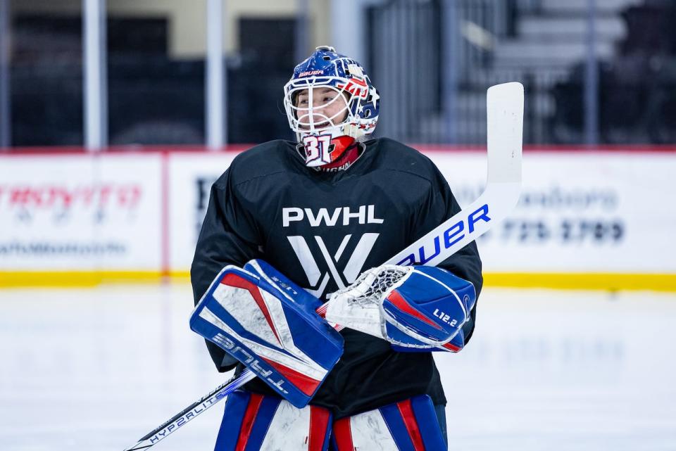 Boston goaltender Aerin Frankel smiles during practice in Utica, N.Y., on Monday. Boston sat several of its top players, including Frankel, for Monday's game as the team prepares to make its final cuts later this week.