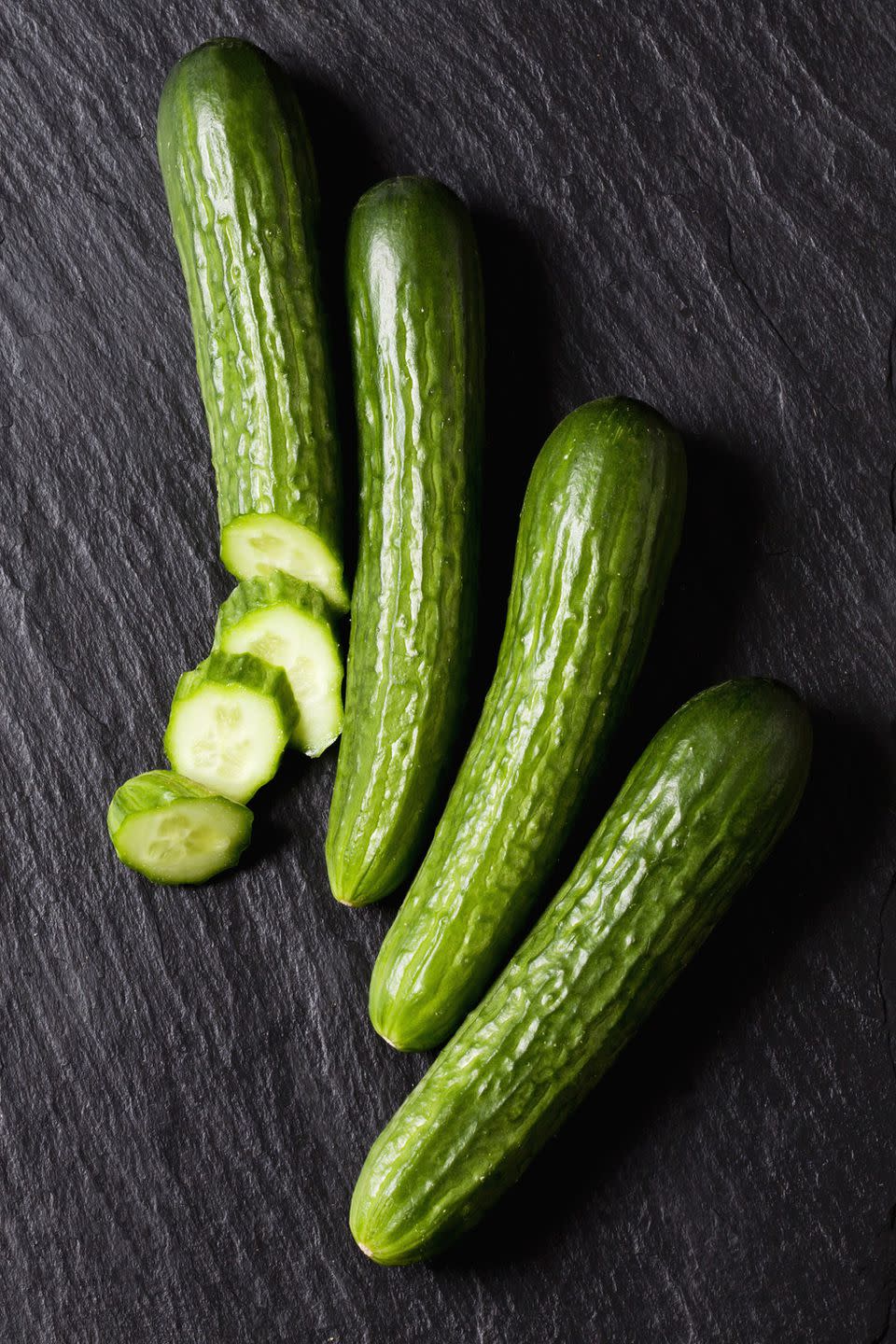 <p>Since cucumbers are low in calories (you'll only tally <a rel="nofollow noopener" href="https://www.calorieking.com/foods/calories-in-fresh-or-dried-vegetables-cucumber-with-peel-raw_f-ZmlkPTcwODI2.html" target="_blank" data-ylk="slk:about 16 per cup;elm:context_link;itc:0;sec:content-canvas" class="link ">about 16 per cup</a> when sliced), loaded with water, and contain <a rel="nofollow noopener" href="https://healthyeating.sfgate.com/much-fiber-cucumbers-4979.html" target="_blank" data-ylk="slk:hearty fiber in the peel,;elm:context_link;itc:0;sec:content-canvas" class="link ">hearty fiber in the peel,</a> eating some as a daily snack can keep you feeling full, making you less likely to eat foods that make the number on the scale creep up.</p>