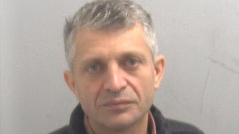 Custody image of Marius Draghici