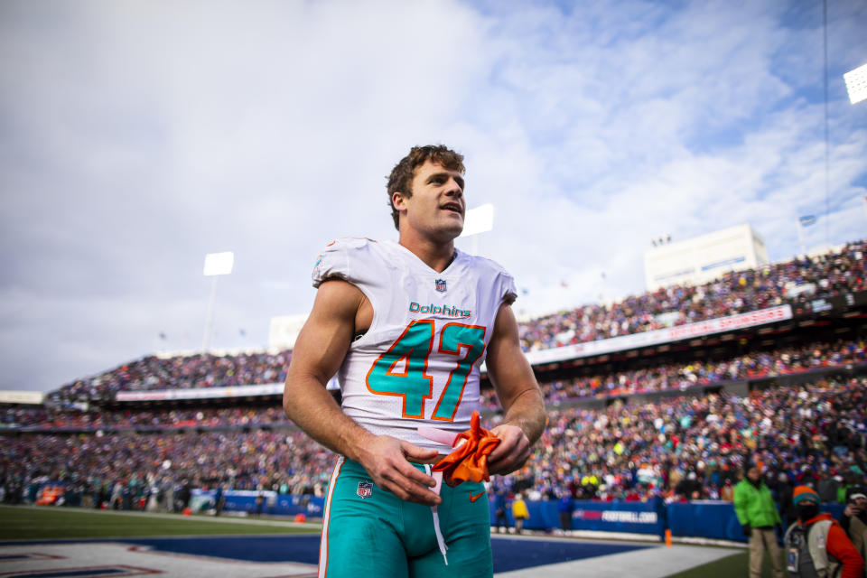 ORCHARD PARK, NY - DECEMBER 30:  Kiko Alonso #47 of the Miami Dolphins is escorted from the field after being ejected during the third quarter against the Buffalo Bills at New Era Field on December 30, 2018 in Orchard Park, New York. Buffalo defeats Miami 42-17. (Photo by Brett Carlsen/Getty Images)