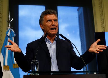 Argentine President Mauricio Macri gestures during a news conference at the Casa Rosada Government House in Buenos Aires, Argentina February 22, 2016. REUTERS/Enrique Marcarian