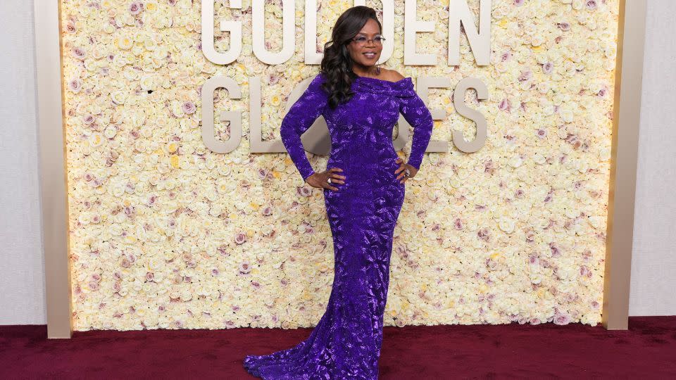 Oprah Winfrey gave a nod to “The Color Purple,” which she co-produced, in custom Louis Vuitton. She joked to People magazine: “I'm doing for purple what Barbie did for pink!” - Jordan Strauss/Invision/AP