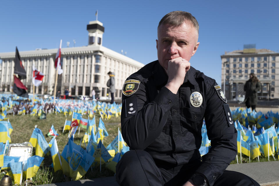 Ukrainian police officer Volodymyr Nikulin poses for a photo in downtown Kyiv, Monday March 11, 2024. Nikulin helped Associated Press journalists during the siege of Mariupol, in the early days of Russia's invasion of Ukraine in 2022, while filming "20 Days in Mariupol" which won the best documentary Oscar on Sunday night. (AP Photo/Bela Szandelszky)