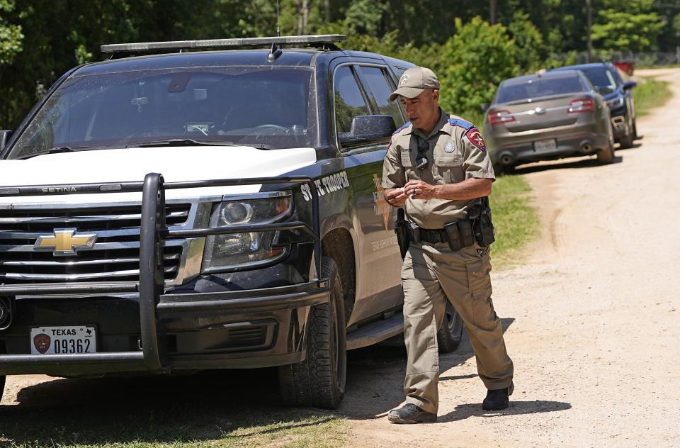 Law enforcement officials continue to work in the neighborhood Sunday, April 30, 2023, where a mass shooting occurred Friday night, in Cleveland, Texas. The search for a man who allegedly shot his neighbors after they asked him to stop firing off rounds in his yard stretched into a second day Sunday, with authorities saying the man could be anywhere by now. Francisco Oropeza, 38, fled after the shooting Friday night that left several people dead, including a young boy. (AP Photo/David J. Phillip)