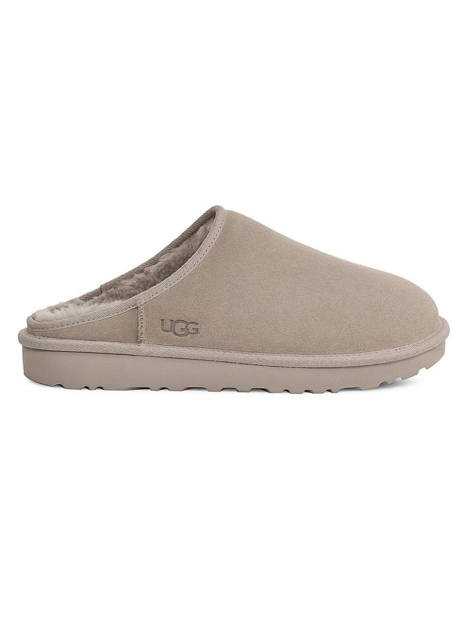 <p><strong>UGG</strong></p><p>saksfifthavenue.com</p><p><strong>$100.00</strong></p><p><a href="https://go.redirectingat.com?id=74968X1596630&url=https%3A%2F%2Fwww.saksfifthavenue.com%2Fproduct%2Fugg-classic-suede-slip-on-shoes-0400016647630.html&sref=https%3A%2F%2Fwww.harpersbazaar.com%2Ffashion%2Ftrends%2Fg42249743%2Fgifts-for-husband%2F" rel="nofollow noopener" target="_blank" data-ylk="slk:Shop Now;elm:context_link;itc:0" class="link ">Shop Now</a></p><p>Ugg slippers are a cozy classic—his toes will feel warm in toasty in this shearling-lined pair.</p>