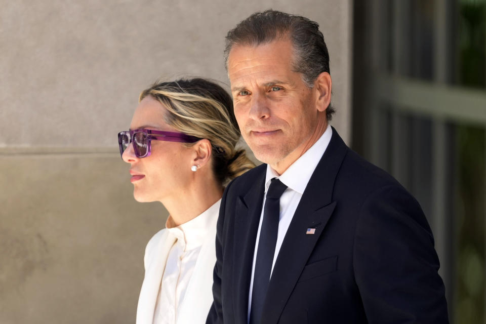 Hunter Biden departs from federal court with his wife, Melissa Cohen Biden, Friday, June 7, 2024, in Wilmington, Del. (AP Photo/Matt Slocum)