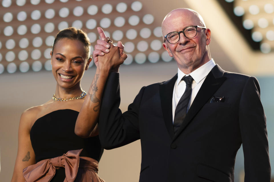 Zoe Saldana, left, and director Jacques Audiard pose for photographers upon departure from the premiere of the film 'Emilia Perez' at the 77th international film festival, Cannes, southern France, Saturday, May 18, 2024. (Photo by Scott A Garfitt/Invision/AP)