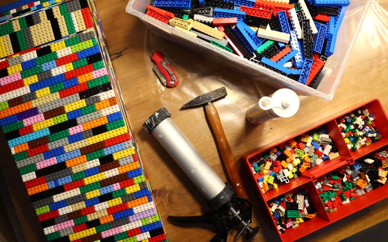 Donated Lego bricks and tools needed to build a wheelchair ramp are seen in the living room of "Lego grandma" Rita Ebel at her flat in Hanau