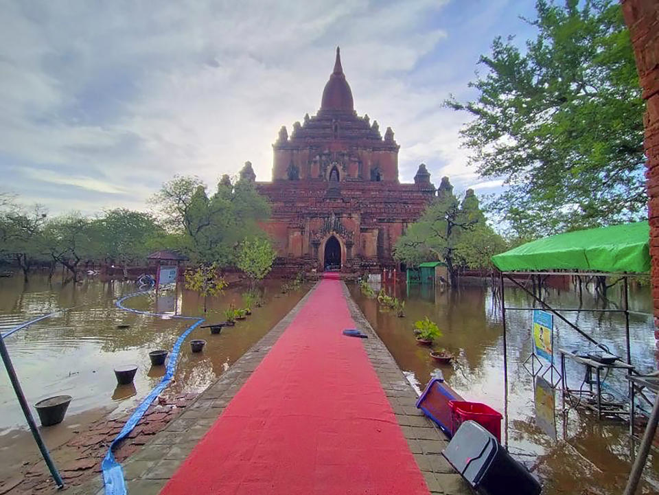 This photo provided by Myanmar Military True News Information Team on Monday, May 15, 2023, shows flooded areas caused by Cyclone Mocha near old temple in Bagan, Central Myanmar. Rescuers early Monday evacuated about 1,000 people trapped by seawater 3.6 meters (12 feet ) deep along western Myanmar's coast after the powerful cyclone injured hundreds and cut off communications. (Military True News Information Team via AP)