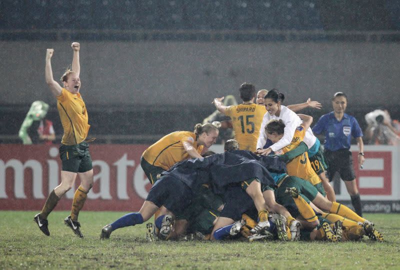 FILE PHOTO: Australia celebrate after beating North Korea 5-4 on penalties in the final of the AFC Women's Asian Cup at the Chengdu Sports Centre in China.