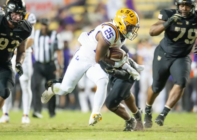 Suspended LSU RB Trey Holly won't face attempted murder charge, grand jury  decides - Yahoo Sports