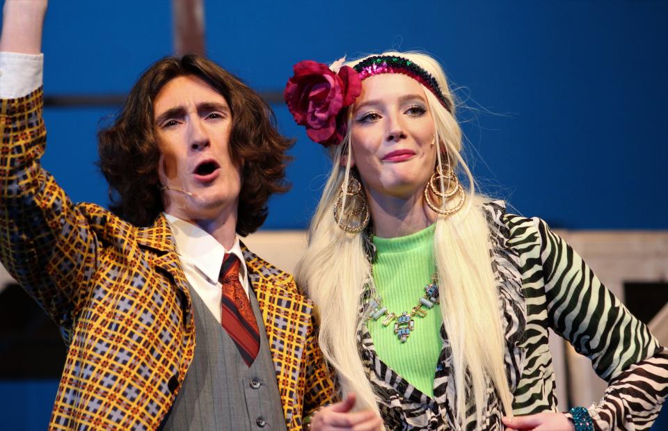 Harry Wormwood (Jackson Riley) and his wife, Zinnia (Clarissa Ward), are all about themselves with little regard for their brilliant daughter in "Matilda," the winter musical by Abilene High School that has evening shows Thursday-Saturday in the school auditorium. Jan. 24 2022