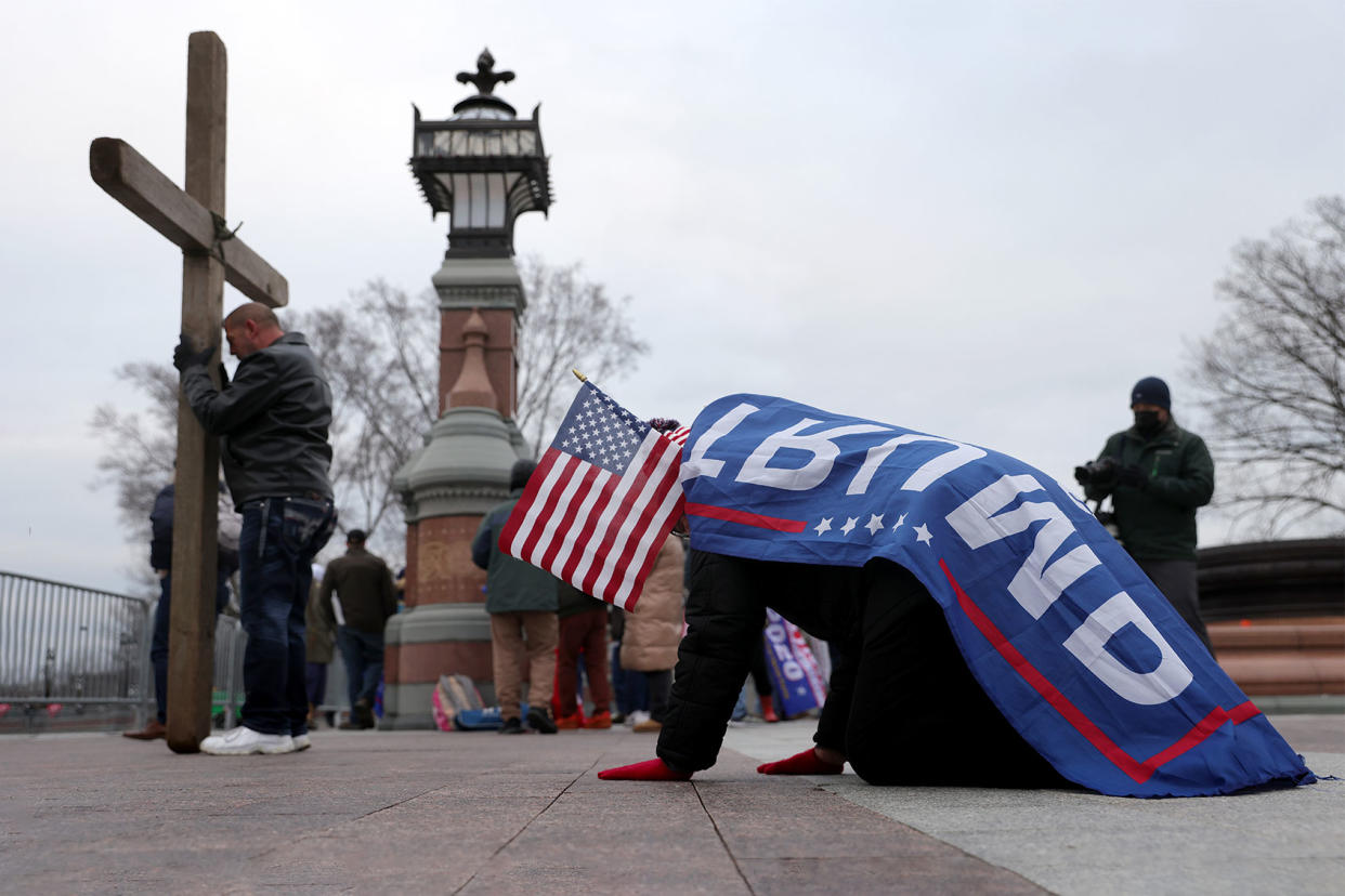 Supporters of U.S. President Donald Trump pray outside the U.S. Capitol Win McNamee/Getty Images