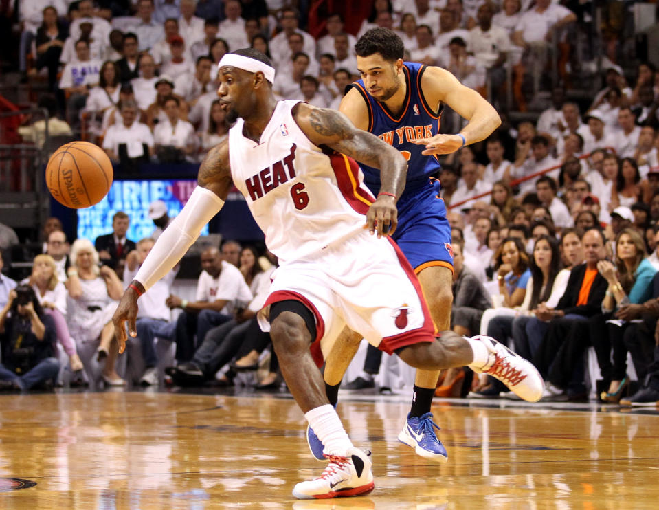 MIAMI, FL - MAY 09: Forward LeBron James #6 of the Miami Heat steals the ball from Guard Landry Fields #2 of the New York Knicks in Game Five of the Eastern Conference Quarterfinals in the 2012 NBA Playoffs on May 9, 2012 at the American Airines Arena in Miami, Florida.