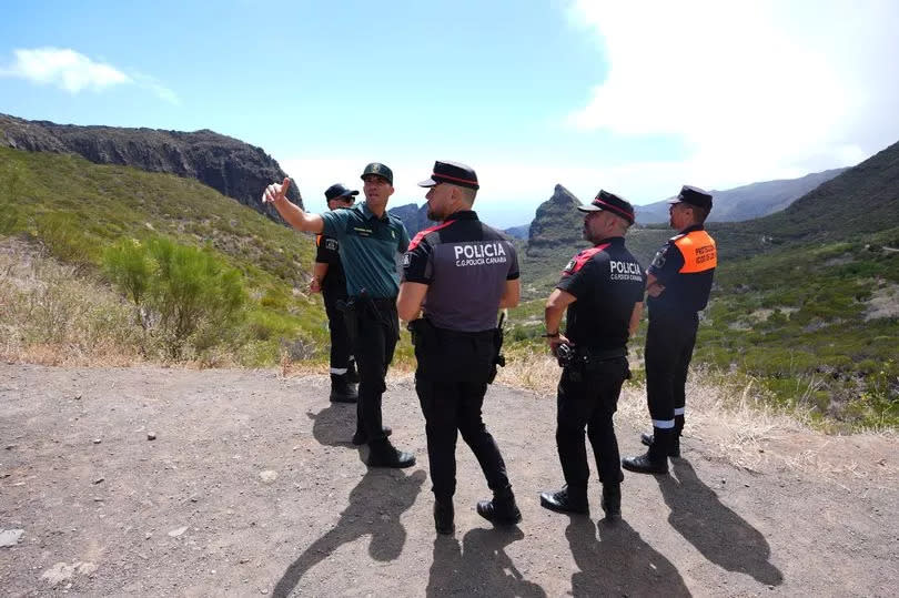 Search team overlook the village of Masca, Tenerife, where the search for missing British teenager Jay Slater, 19, from Oswaldtwistle, Lancashire, continues