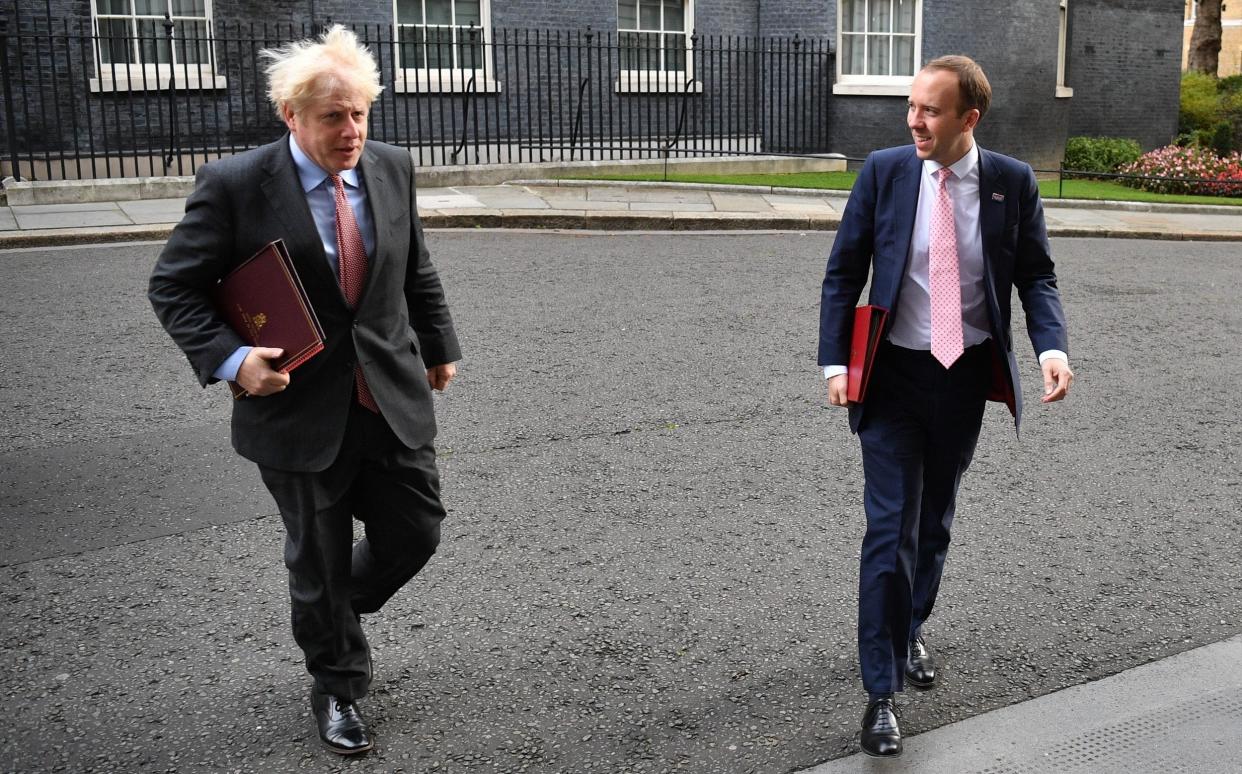 Boris Johnson and Matt Hancock pictured in Downing Street in 2020. The former prime minister gave Mr Hancock advice when his affair was exposed - Leon Neal/Getty Images