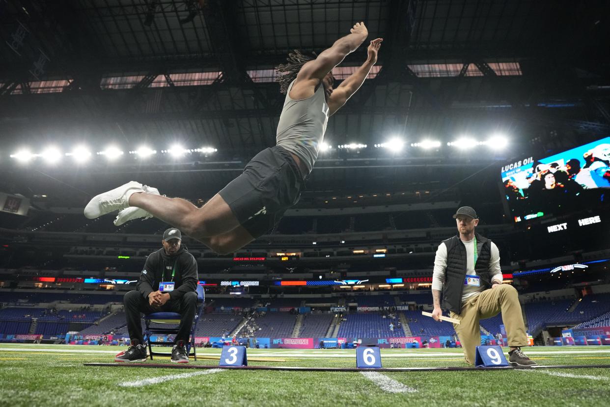 Feb 29, 2024; Indianapolis, IN, USA; Texas linebacker Jaylan Ford (LB12) works out during the 2024 NFL Combine at Lucas Oil Stadium.