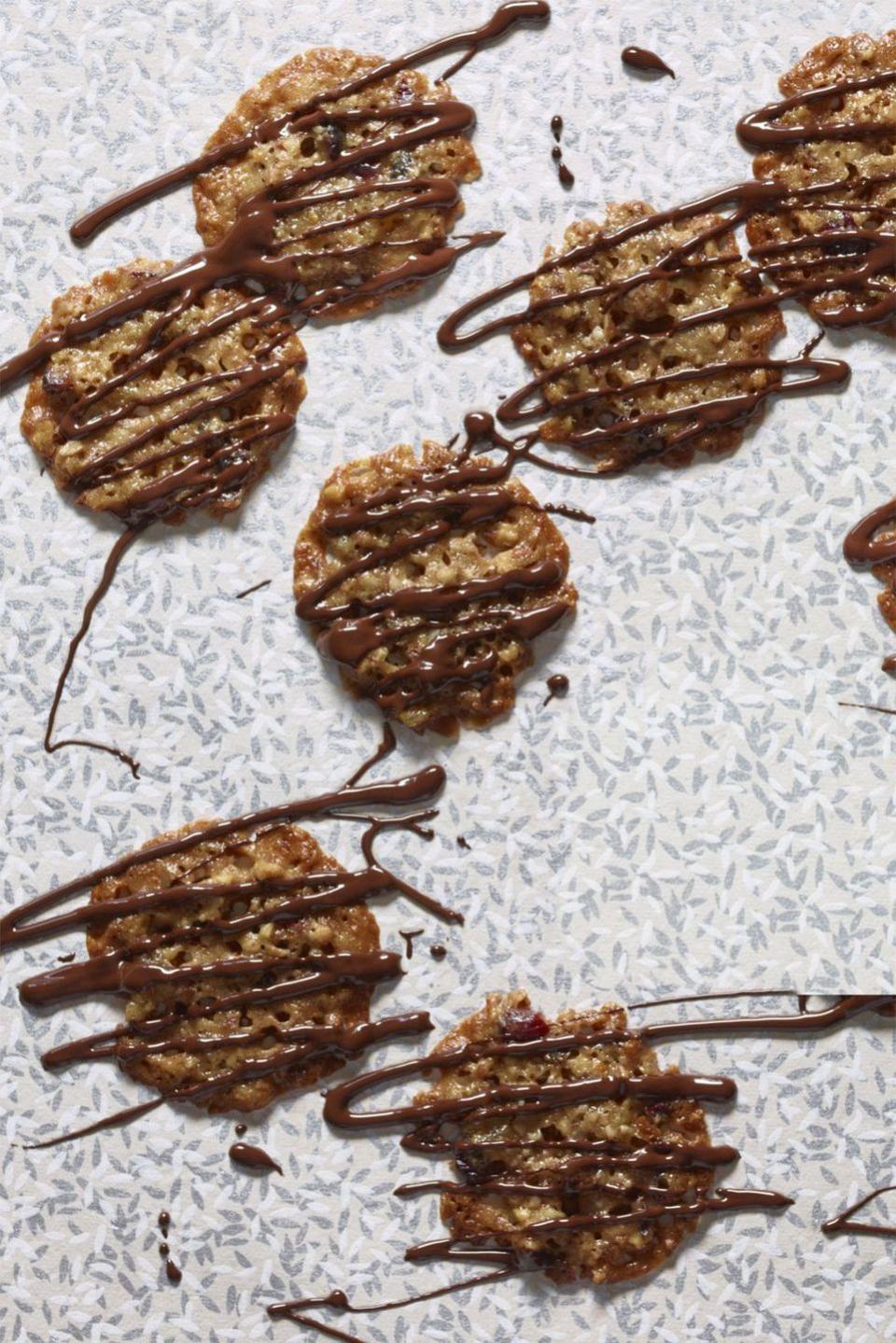 <p>These crispy cookies, make from pecans, butter, sugar, honey and flour, are even better with some chocolate drizzled on top.</p><p><em><a href="https://www.womansday.com/food-recipes/food-drinks/recipes/a60702/florentines-recipe/" rel="nofollow noopener" target="_blank" data-ylk="slk:Get the recipe from Woman's Day »;elm:context_link;itc:0;sec:content-canvas" class="link ">Get the recipe from Woman's Day »</a></em></p>