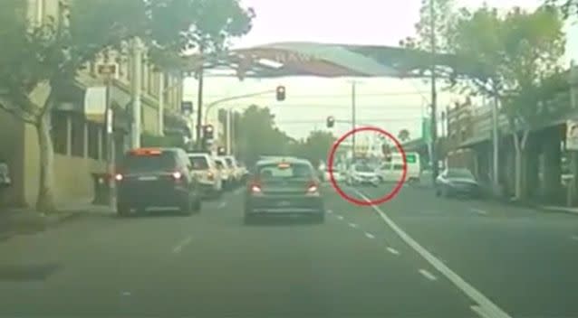 The cyclist manages to land safely on the roof in remarkable footage. Photo: Newsflare/ Dracothian