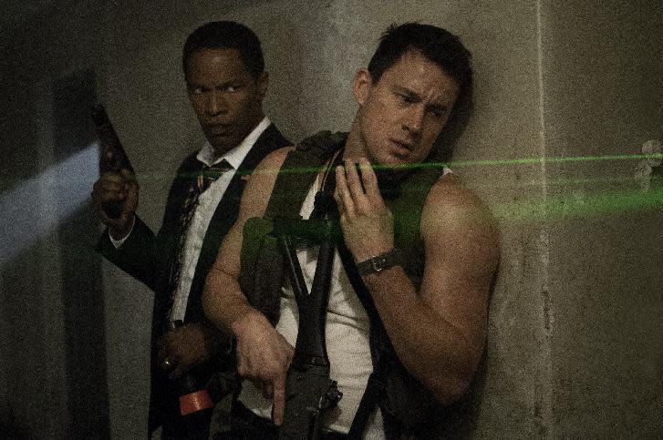 This film publicity image released by Columbia Pictures shows Jamie Foxx, left, and Channing Tatum in a scene from "White House Down." (AP Photo/Sony Columbia Pictures, Reiner Bajo)