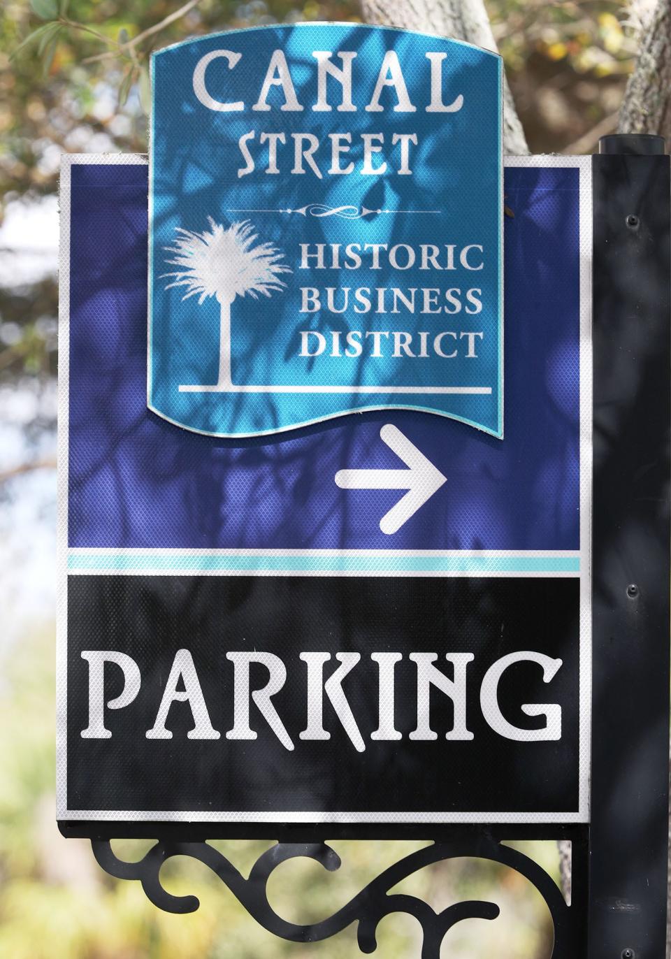 A public parking sign for a Canal Street parking lot, Friday, Feb. 10, 2023, in New Smyrna Beach.