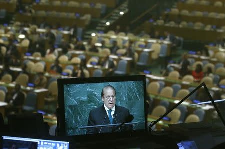 Prime Minister Nawaz Sharif of Pakistan is seen on a monitor in a booth as he addresses the United Nations General Assembly in the Manhattan borough of New York, U.S., September 21, 2016. REUTERS/Carlo Allegri