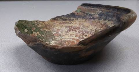 A portion of an earthenware bowl was found after a portion of the wall in the southeast cellar had collapsed during the winter. This bowl is believed to have been discarded when everyone started moving to Mackinac Island in 1781. 