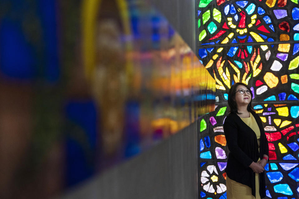 The Rev. Kyunglim Shin Lee, Vice President for International Relations at the Wesley Theological Seminary, poses for a portrait, Thursday, March 10, 2022, in the chapel at the Seminary in Washington. (AP Photo/Jacquelyn Martin)