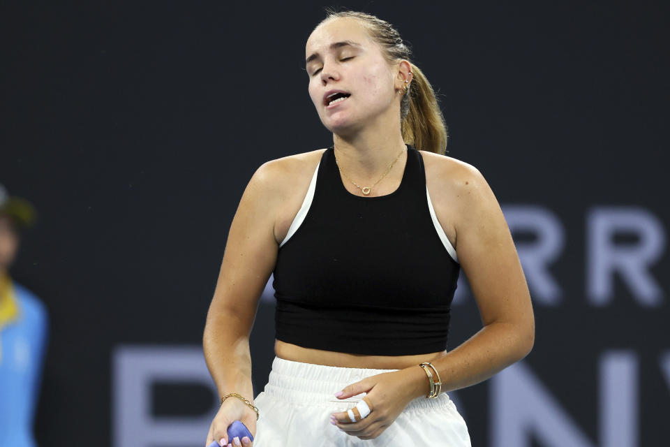 Sofia Kenin of the U.S. reacts after missing a shot in her match against Arina Rodionova of Australia during the Brisbane International tennis tournament in Brisbane, Australia, Tuesday, Jan. 2, 2024. (AP Photo/Tertius Pickard)