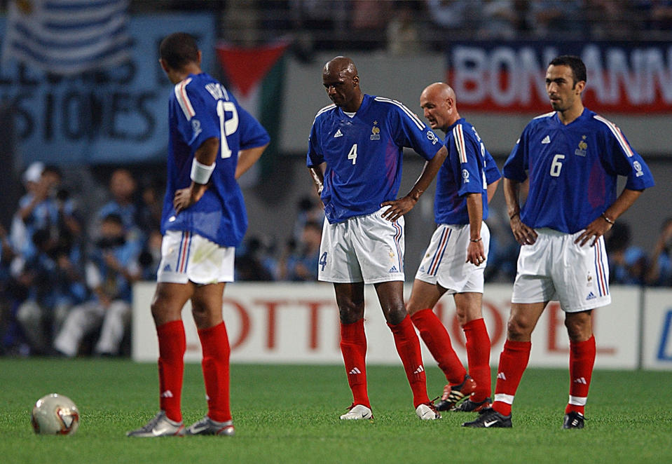 France look dejected after conceding the opener in Seoul