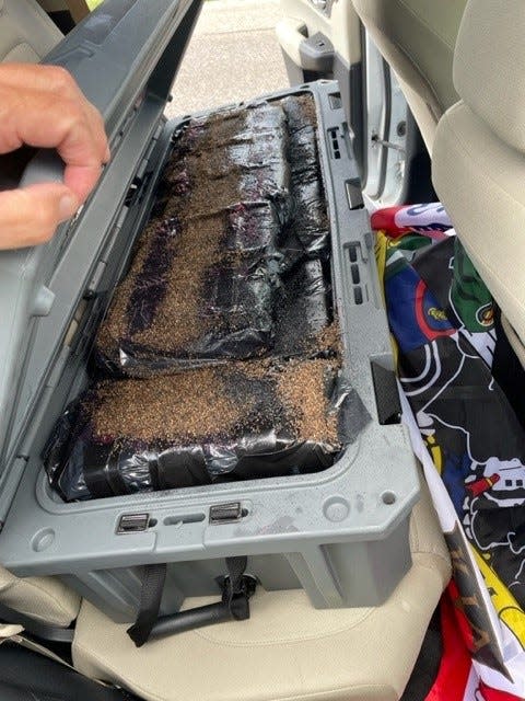 A state Trooper found a large plastic tote on the rear seat containing multiple plastic-wrapped bundles of cocaine in a 2021 Honda CRV that had been traveling east on I-40 near Conway on Thursday. The driver and a passenger were arrested.