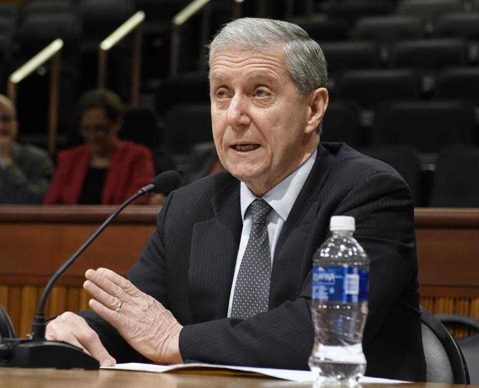 Tom Zugibe, president of of the District Attorneys Association of the State of New York, gives testimony during a joint legislative hearing on elder abuse prevention on Tuesday, Feb. 28, 2017, in Albany, N.Y. (AP Photo/Hans Pennink)