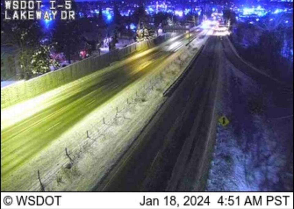 Traffic was light early Thursday on Interstate 5 at Lakeway Drive near downtown Bellingham. Parts of the road remained covered in compact snow and ice.