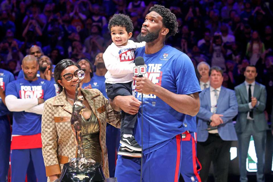 Tim Nwachukwu/Getty Joel Embiid with son Arthur at MVP ceremony