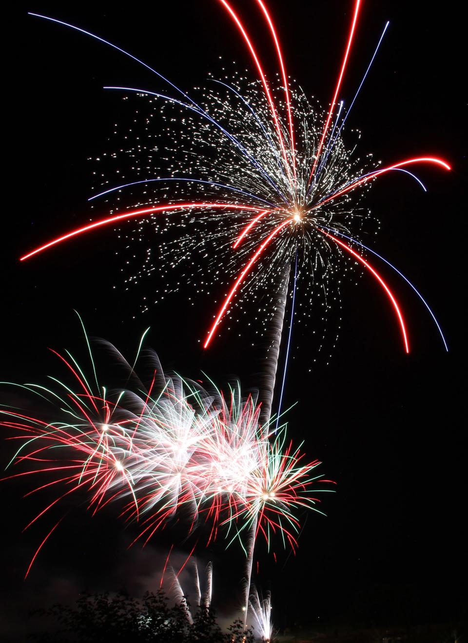 Fireworks explode near the library on July 4, 2021 in West Des Moines.