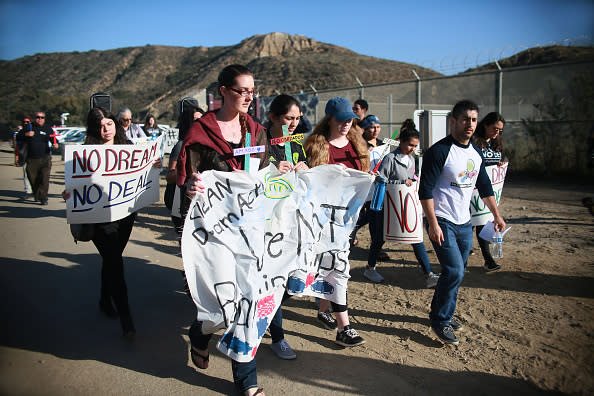 Activists and immigrants march to the border during a rally along the U.S.-Mexico border in support of passage of the Dream Act Feb. 7, 2018 in San Ysidro, California. The rally coincides with the eve of Congress’s spending bill deadline with organizers urging lawmakers to pass a clean Dream Act without provisions for a border wall. (Photo by Sandy Huffaker/Getty Images)