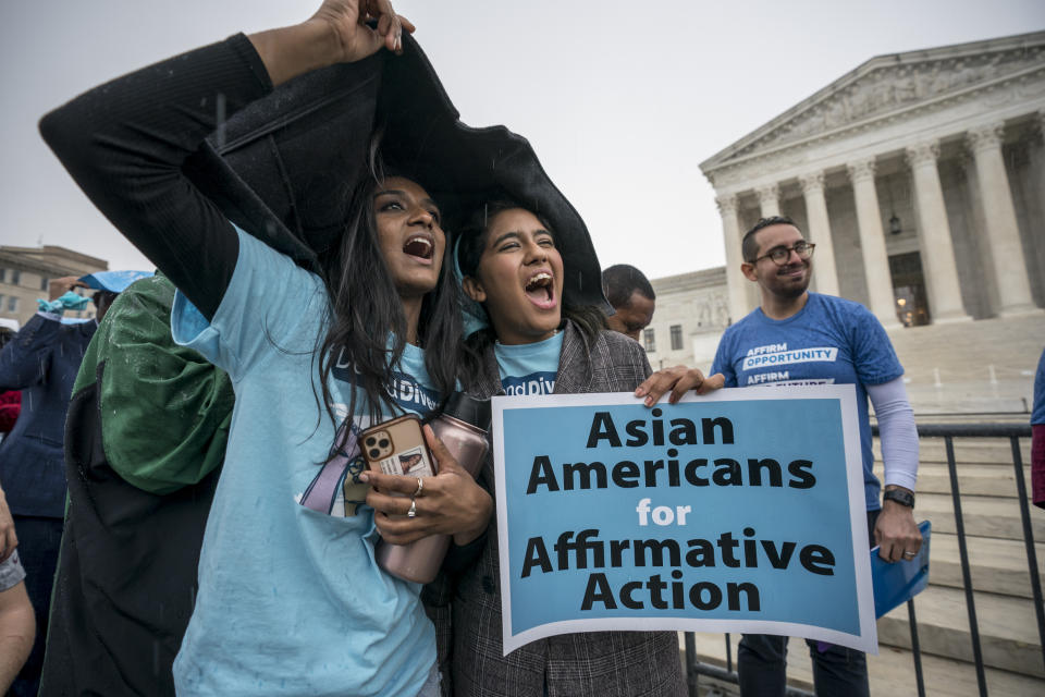 FILE - Harvard students Shruthi Kumar, left, and Muskaan Arshad, join a rally with other activists as the Supreme Court hears oral arguments that could decide the future of affirmative action in college admissions, in Washington, Oct. 31, 2022. Days after the Supreme Court outlawed affirmative action in college admissions on June 29, 2023, activists say they will sue Harvard over its use of legacy preferences for children of alumni. (AP Photo/J. Scott Applewhite, File)