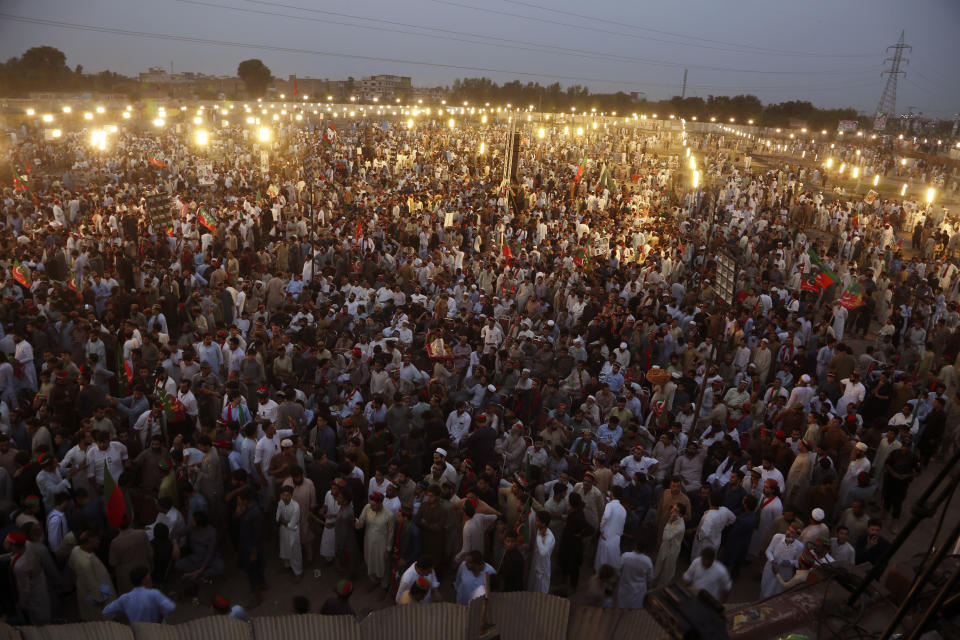 Supporters of Pakistani opposition leader Imran Khan's Tehreek-e-Insaf party attend a rally, in Peshawar, Pakistan, Tuesday, Sept. 6, 2022. Since he was toppled by parliament five months ago, former Prime Minister Imran Khan has demonstrated his popularity with rallies that have drawn huge crowds and signaled to his rivals that he remains a considerable political force. (AP Photo/Mohammad Sajjad)