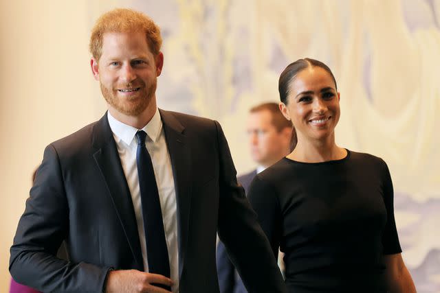 <p>Michael M. Santiago/Getty Images</p> Prince Harry and Meghan Markle attended the finale of Perry's show