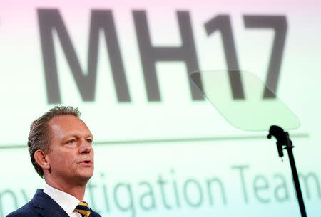 Fred Westerbeke, Chief Prosecutor of the Dutch Prosecutor's office, presents interim results in the ongoing investigation of the 2014 MH17 crash that killed 298 people over eastern Ukraine, during a news conference in Bunnik, Netherlands, May 24, 2018. REUTERS/Francois Lenoir