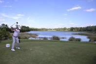 FILE- In this Sunday, Feb. 28, 2021 file photo, Kevin Kisner tees off on the 13th hole during the final round of the Workday Championship golf tournament, in Bradenton, Fla. Kisner is among four players on the PGA Tour board who had to work through a plan to return to golf from the COVID-19 pandemic. (AP Photo/Phelan M. Ebenhack, File)