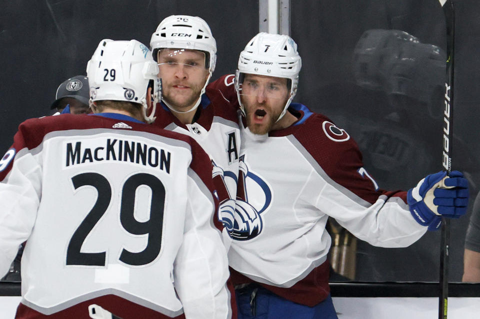 LAS VEGAS, NEVADA - JUNE 10:  Nathan MacKinnon #29, Mikko Rantanen #96 and Devon Toews #7 of the Colorado Avalanche celebrate Toews' first-period goal against the Vegas Golden Knights in Game Six of the Second Round of the 2021 Stanley Cup Playoffs at T-Mobile Arena on June 10, 2021 in Las Vegas, Nevada. The Golden Knights defeated the Avalanche 6-3 to win the series.  (Photo by Ethan Miller/Getty Images)