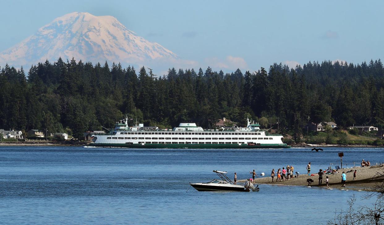 The Washington State Ferry Walla Walla passes the southern tip of Illahee State Park Beach and heads into Rich Passage from Bremerton on July 1.