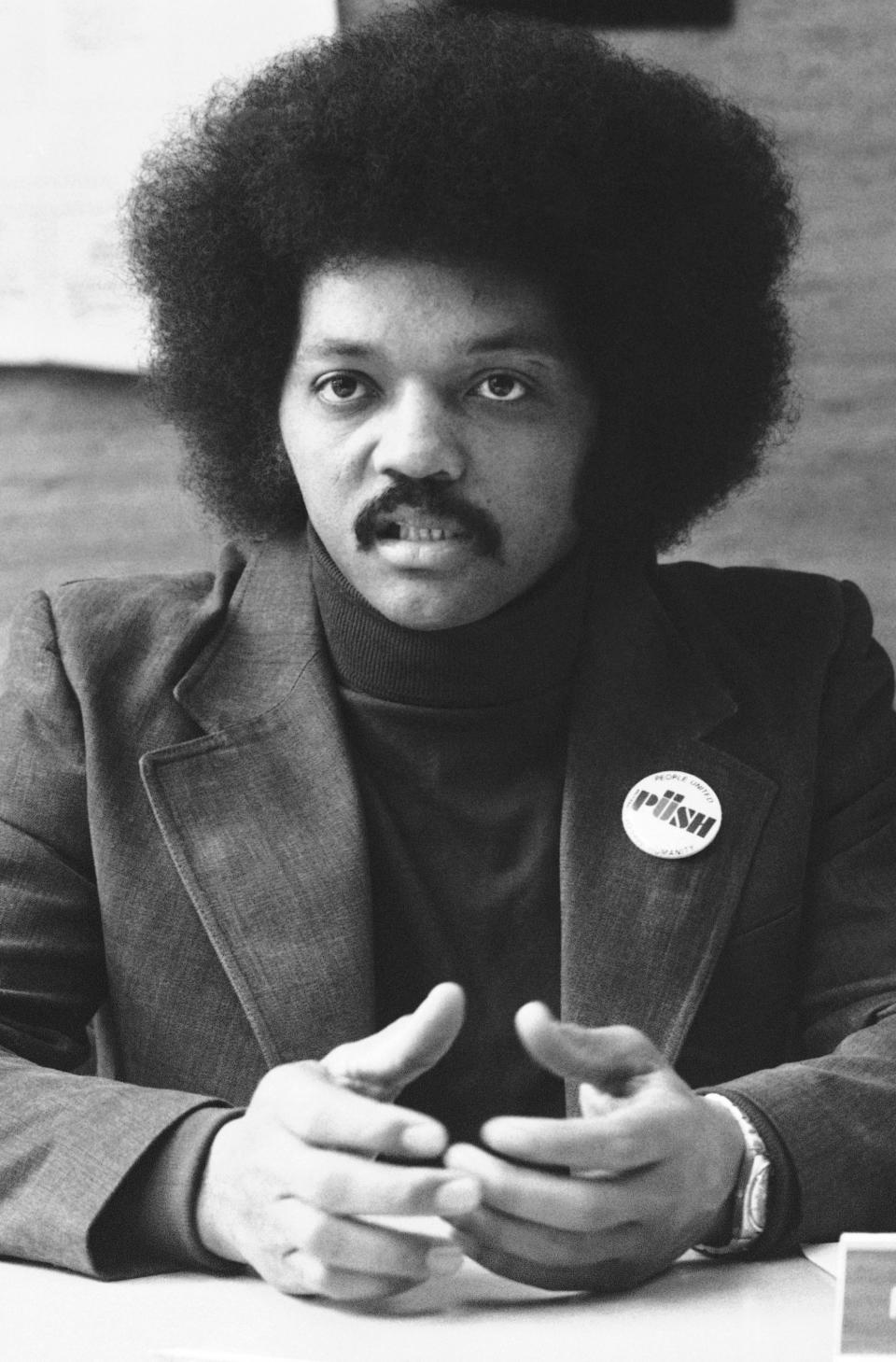 FILE - Rev. Jesse L. Jackson, president of Operation: PUSH, announced the agreement with Avon Products on a $59 million "mutual cooperation pact" to foster increased economic opportunities for black and other nonwhite groups at a news conference, in New York, July 11, 1973. Jackson plans to step down from leading the Chicago civil rights organization Rainbow PUSH Coalition he founded in 1971, his son's congressional office said Friday, July 14, 2023. (AP Photo/File)